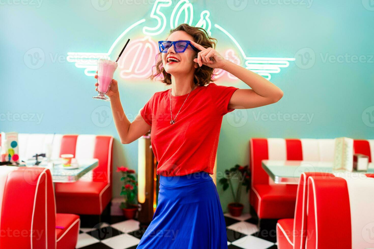 stylish smiling woman in retro vintage cafe photo