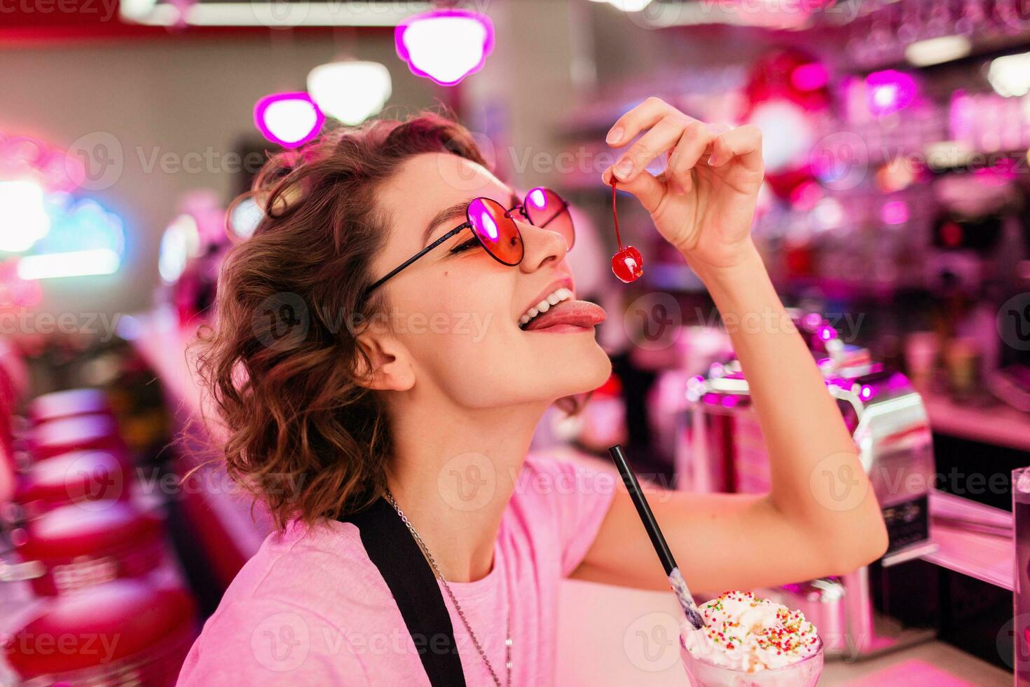 stylish smiling woman in retro vintage cafe photo