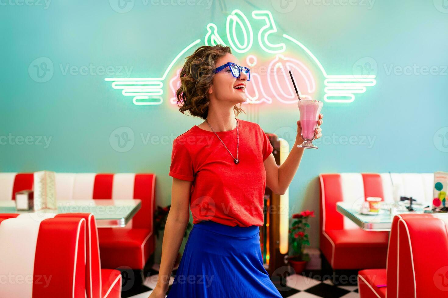 stylish smiling woman in retro vintage cafe photo
