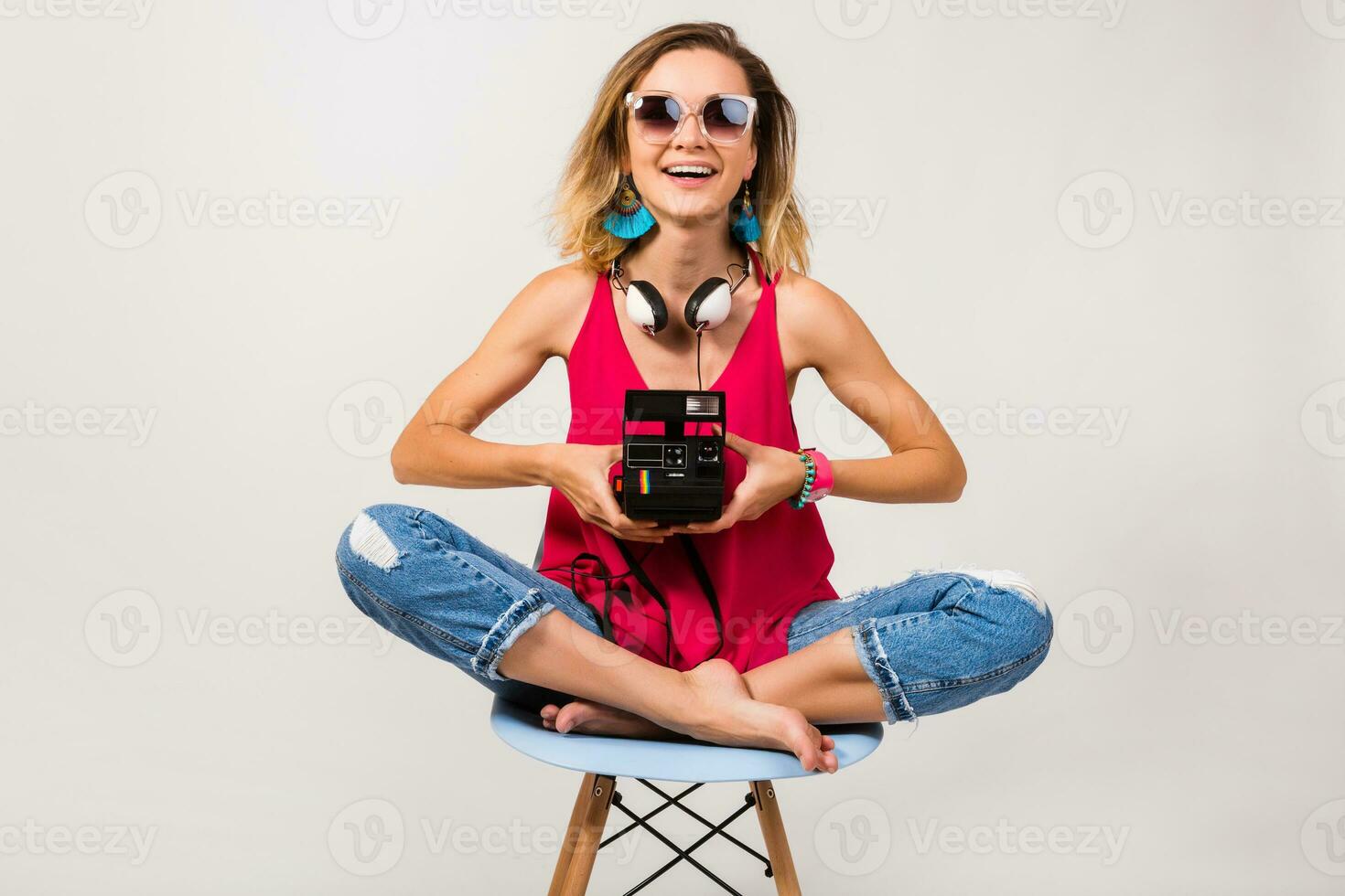 young hipster beautiful woman sitting on chair photo