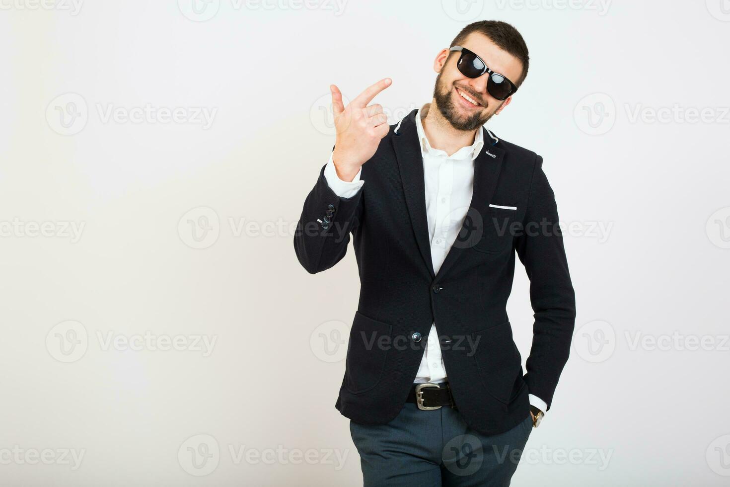 young handsome stylish hipster man in black jacket, business style photo