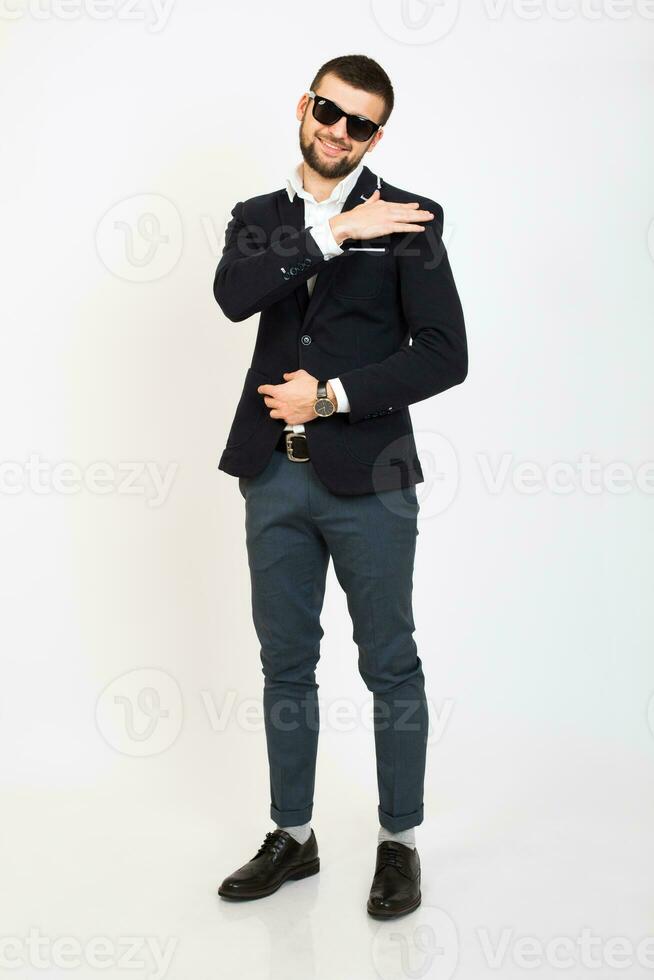 young handsome stylish hipster man in black jacket, business style photo