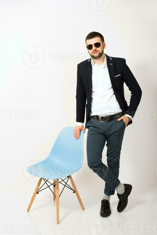 young handsome stylish hipster man in black jacket, business style photo