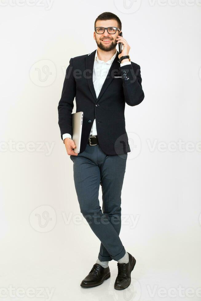 young handsome stylish hipster man in black jacket working at office table, business style photo