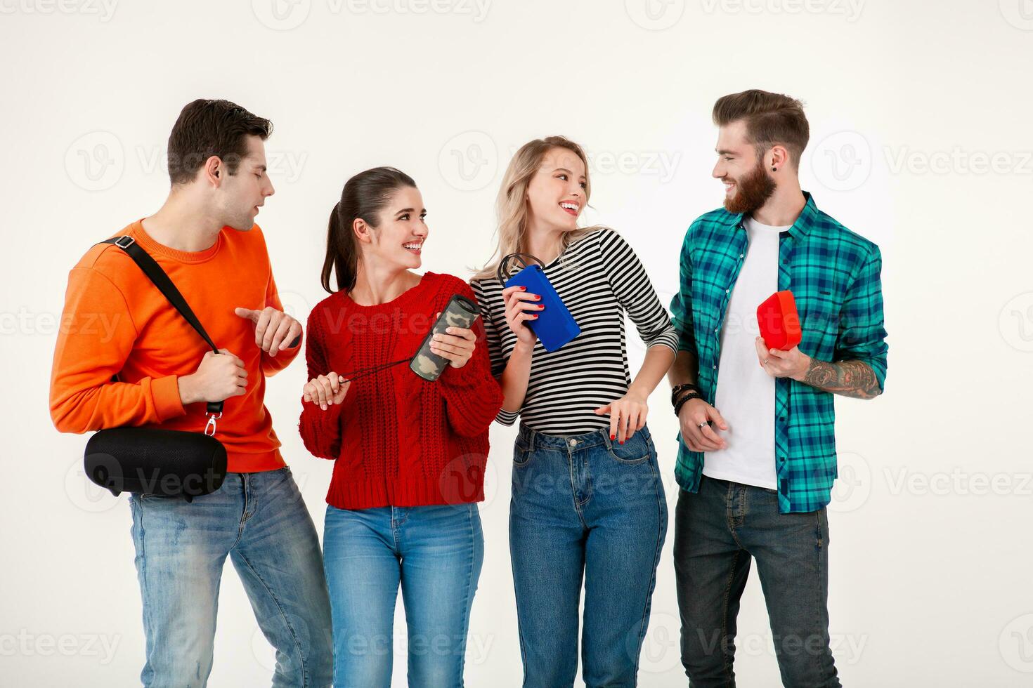 company of friends having fun together listening to music photo