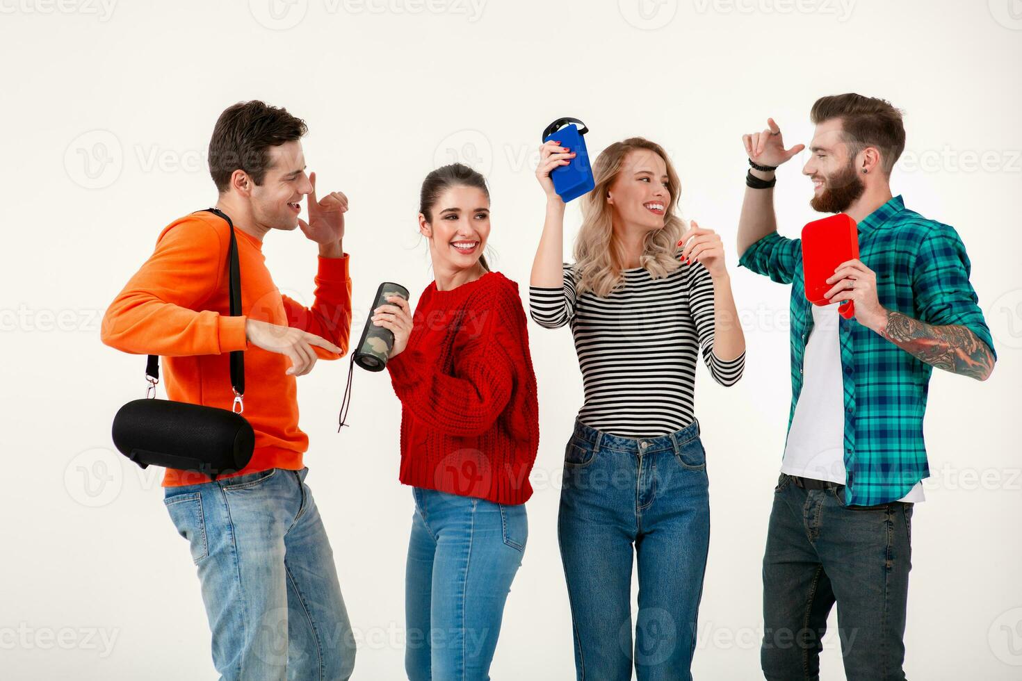 company of friends having fun together listening to music photo