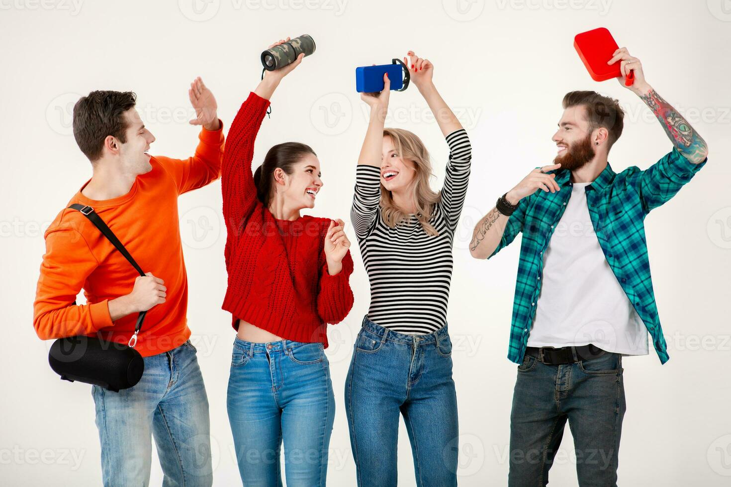 company of friends having fun together listening to music photo