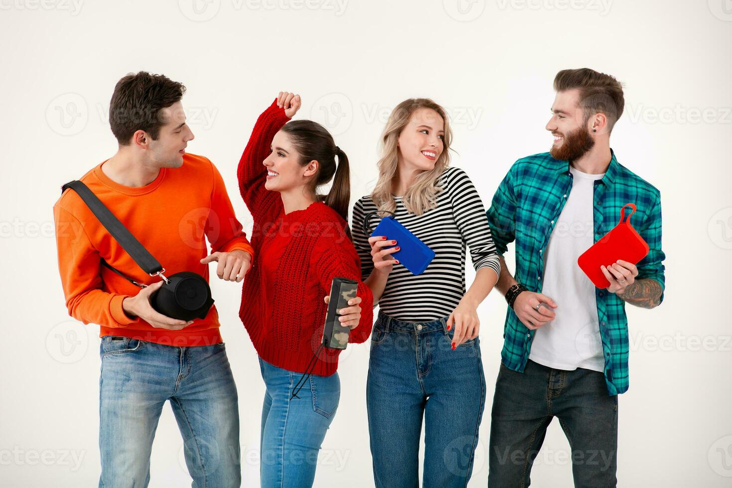 company of friends having fun together listening to music photo