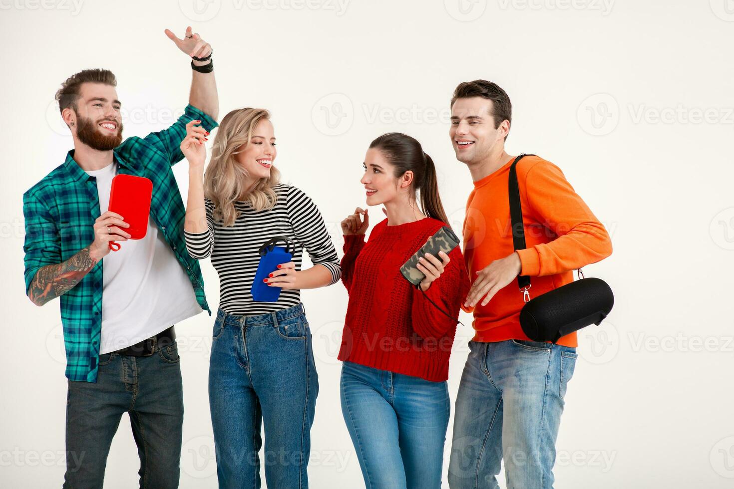 company of friends having fun together listening to music photo