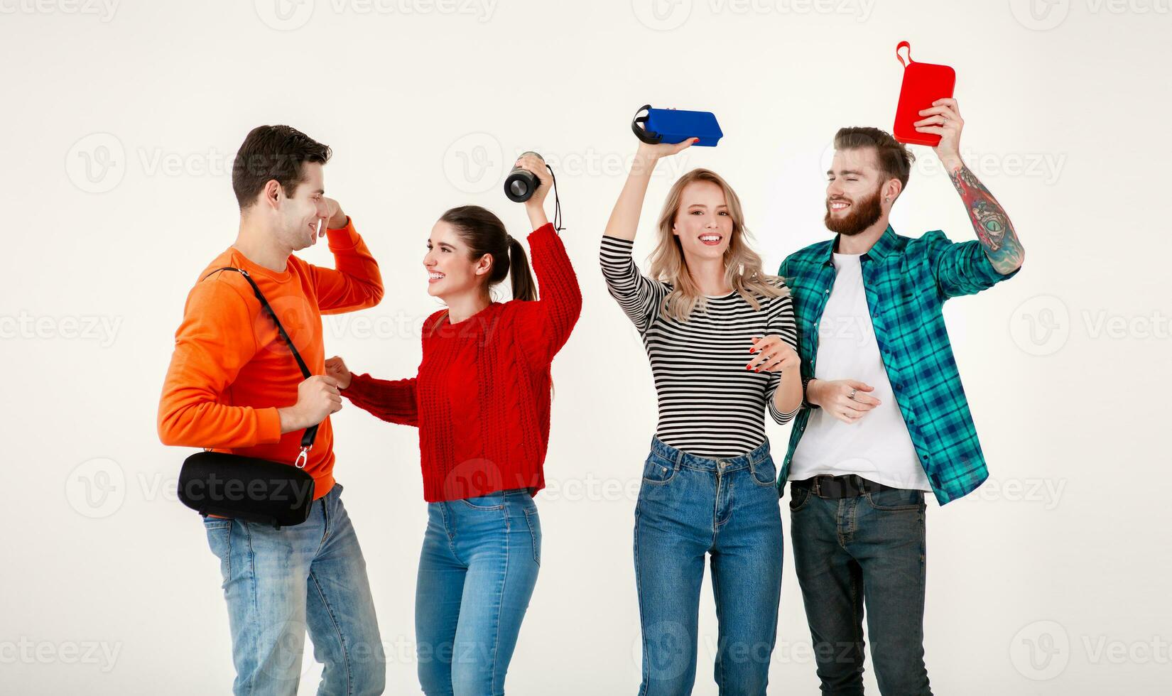 company of friends having fun together listening to music photo