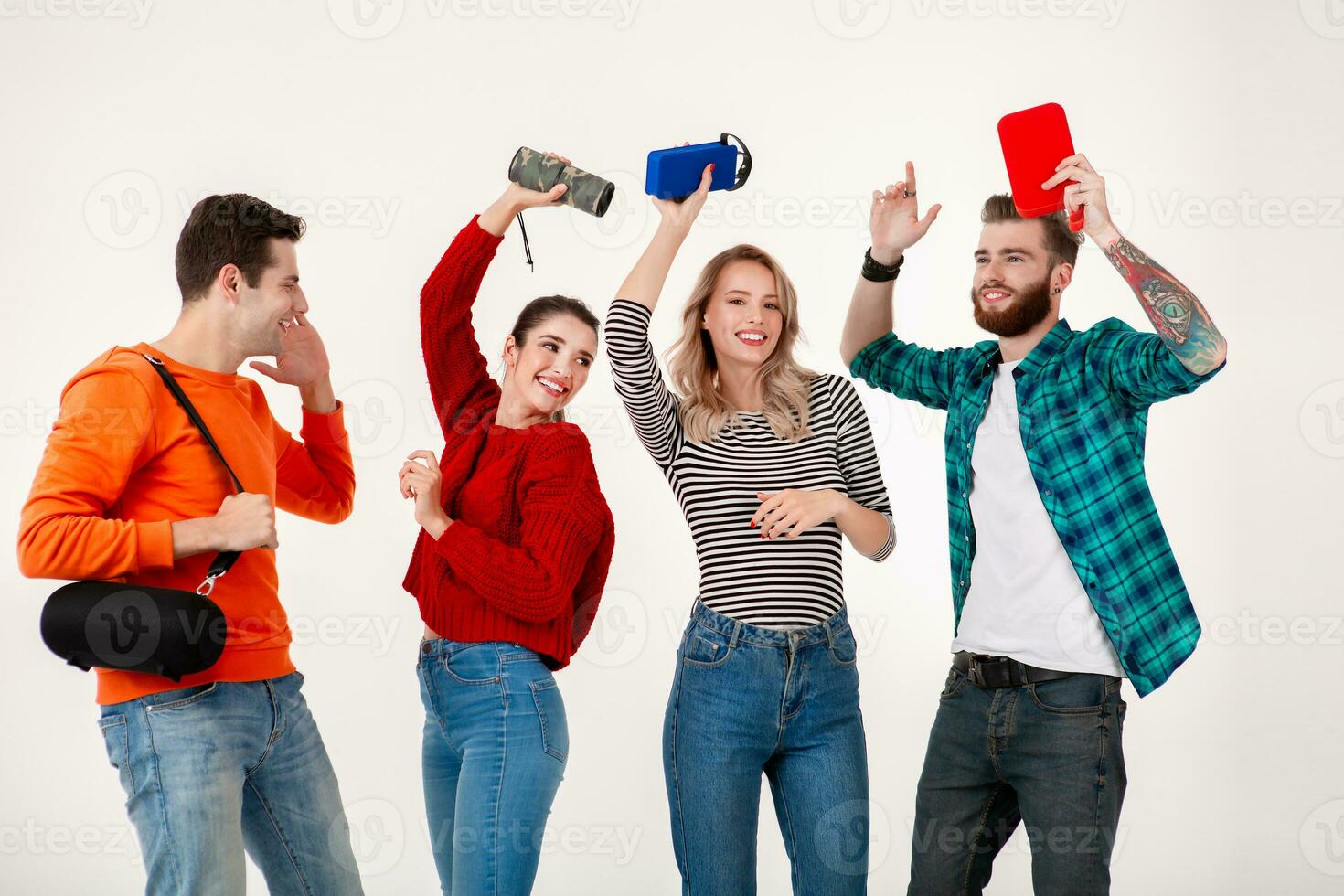 company of friends having fun together listening to music photo