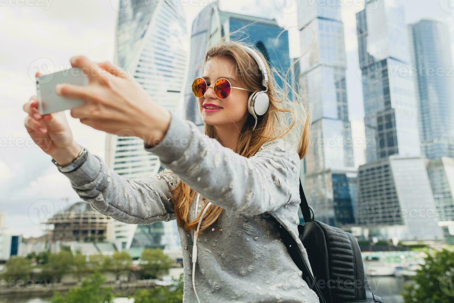 young hipster woman in street photo