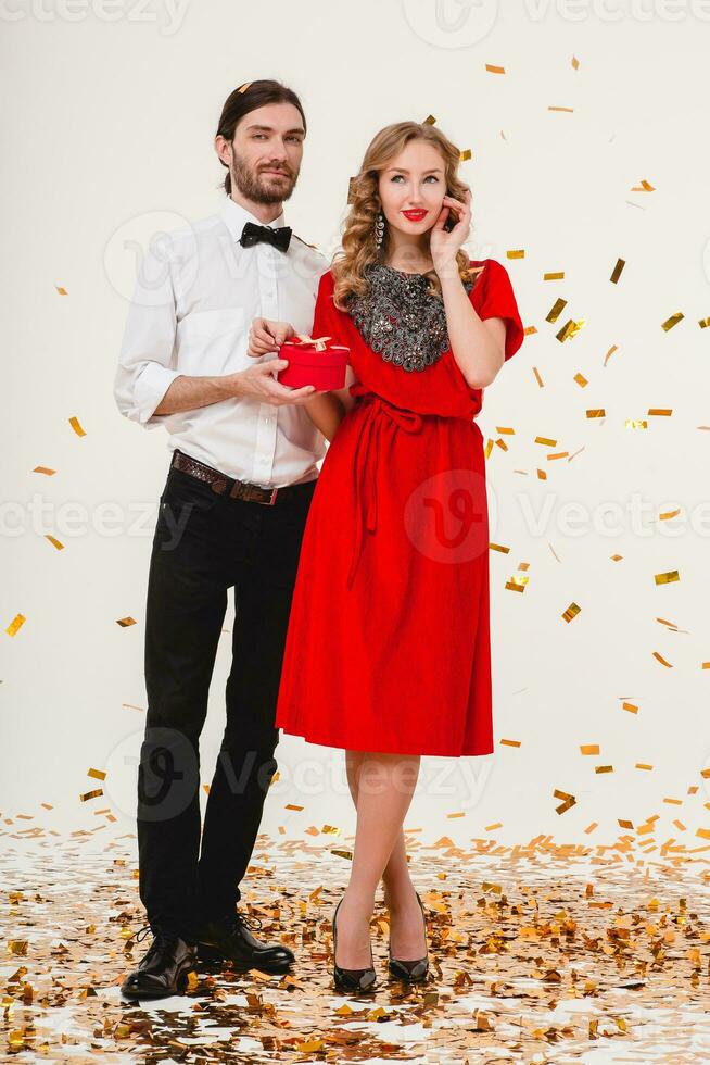beautiful stylish couple in love celebrating new year photo
