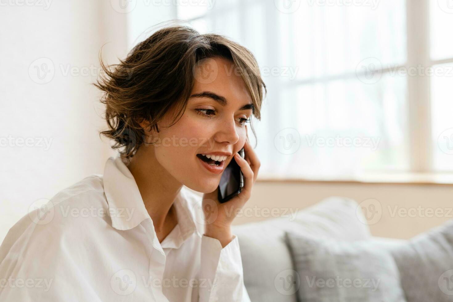 young pretty woman working online freelancer, remote job photo