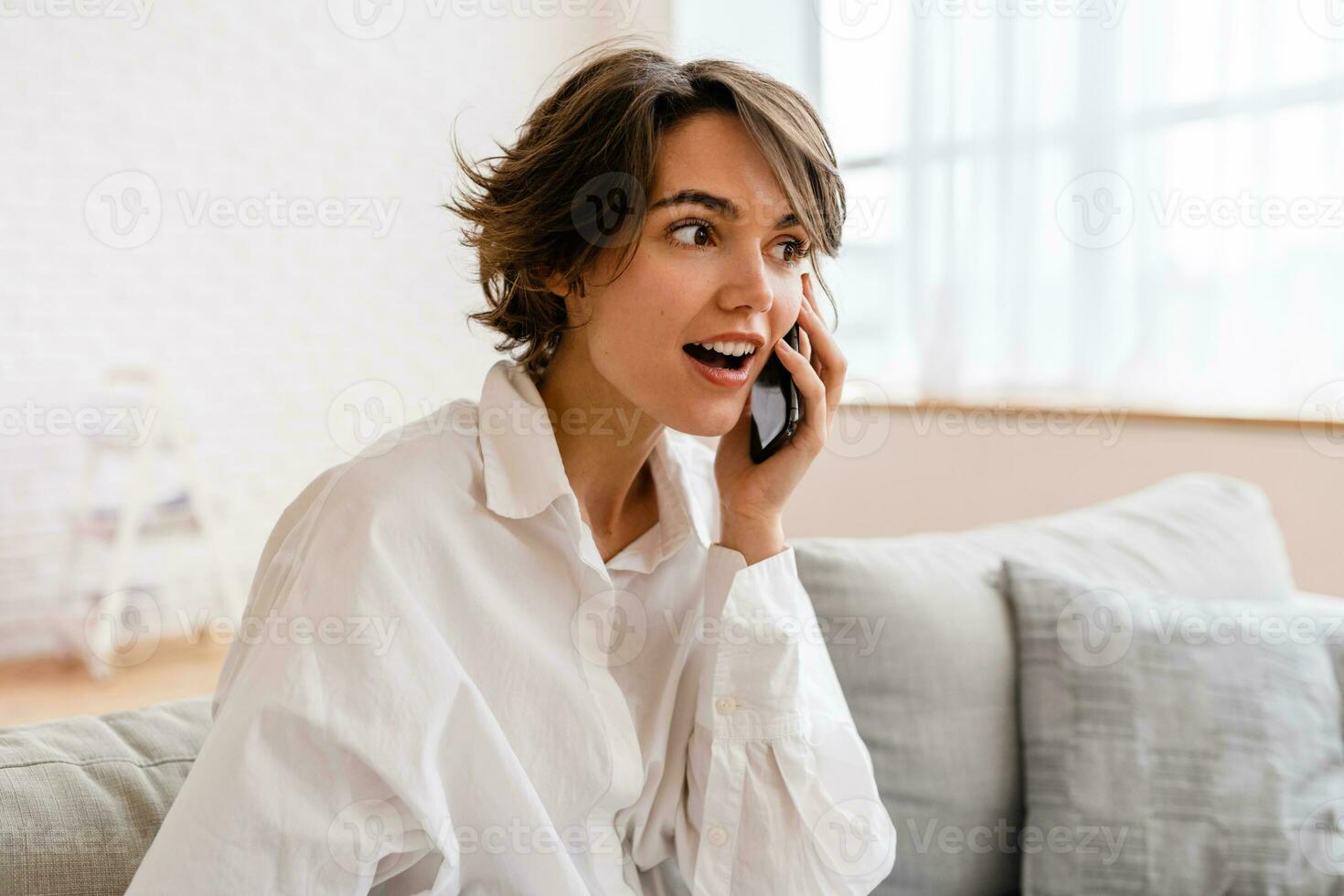 young pretty woman working online freelancer, remote job photo