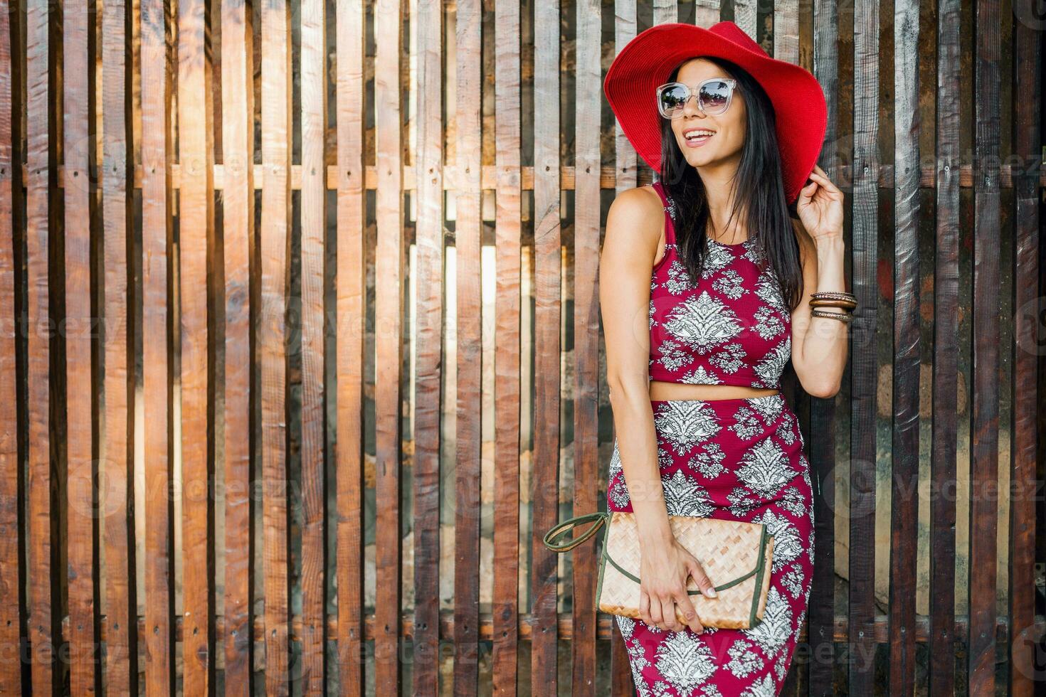 stylish beautiful woman in printed outfit, summer style fashion photo