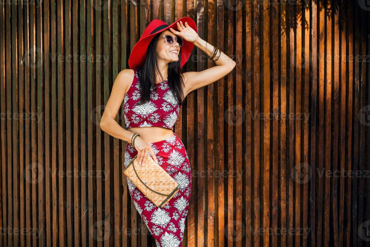 stylish beautiful woman in printed outfit, summer style fashion photo