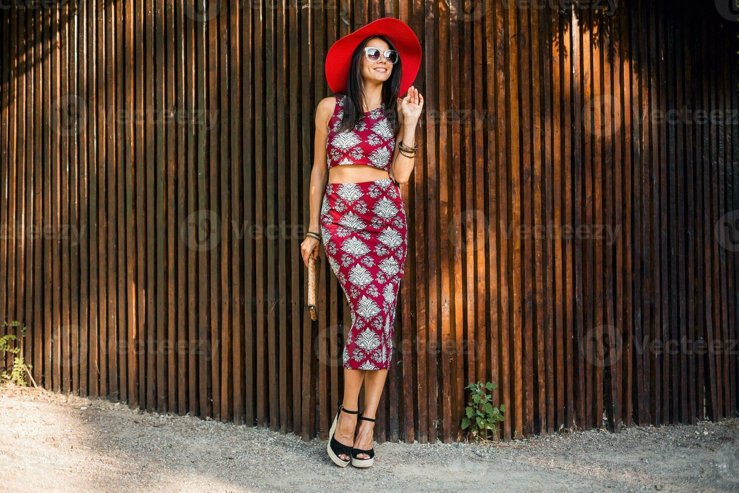 stylish beautiful woman in printed outfit, summer style fashion photo