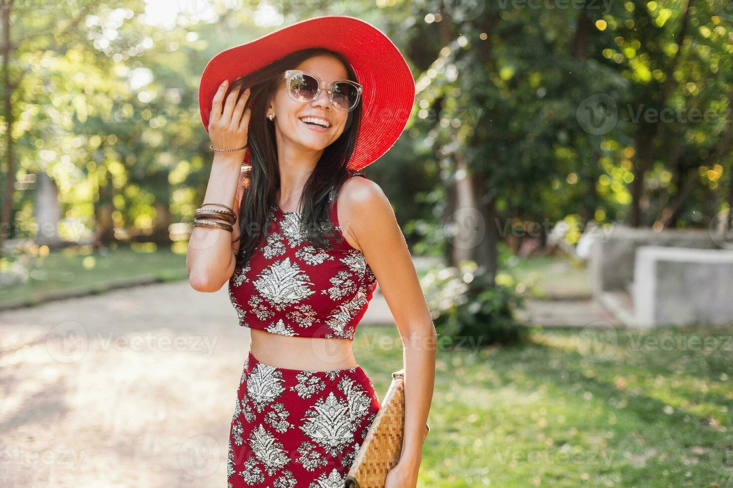 stylish woman in printed outfit, summer style photo