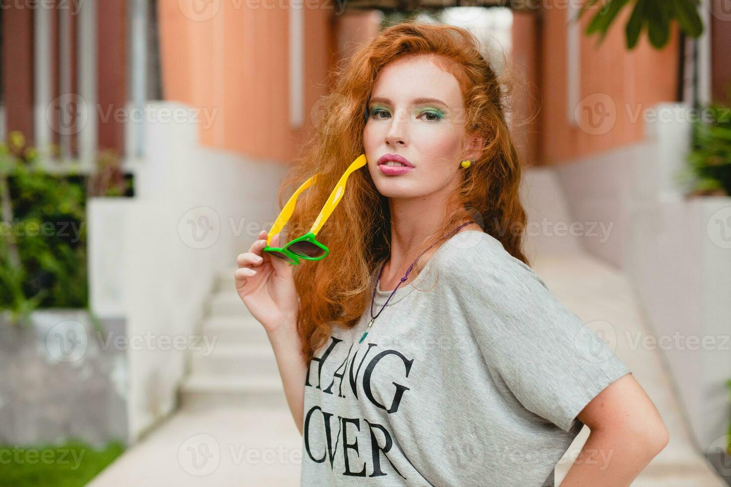 young stylish woman in fitness apparel photo
