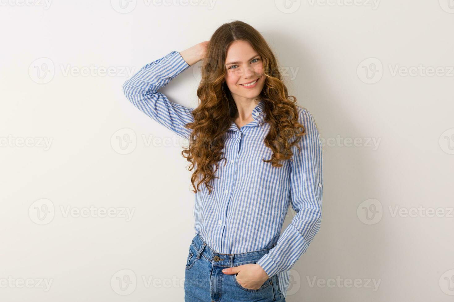 close up portrait of young natural pretty woman with curly haistyle photo