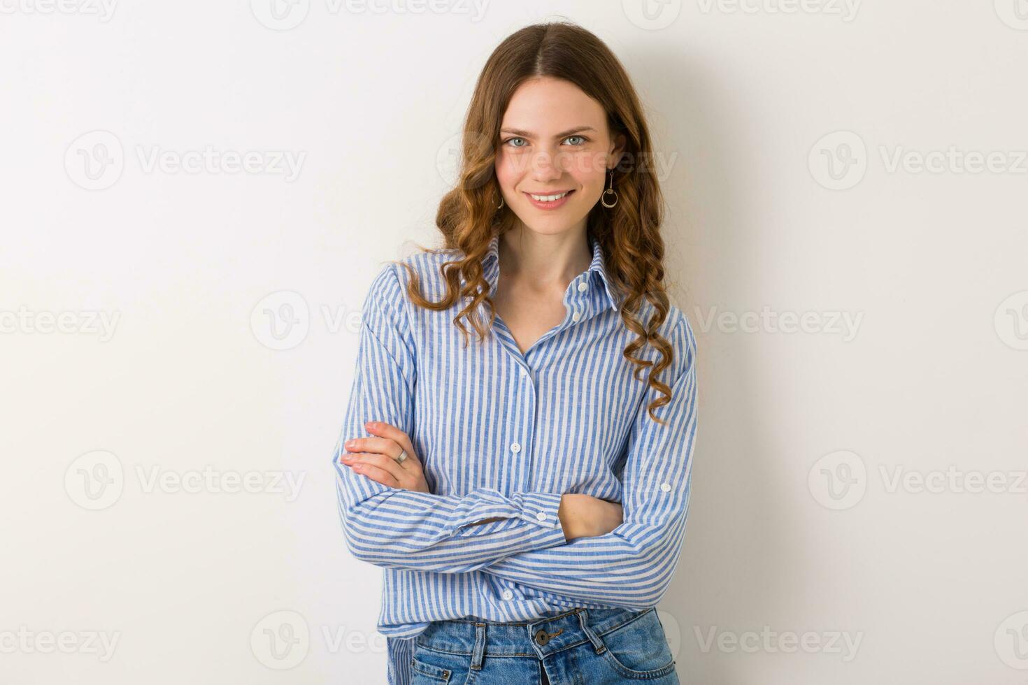 close up portrait of young natural pretty woman with curly haistyle photo