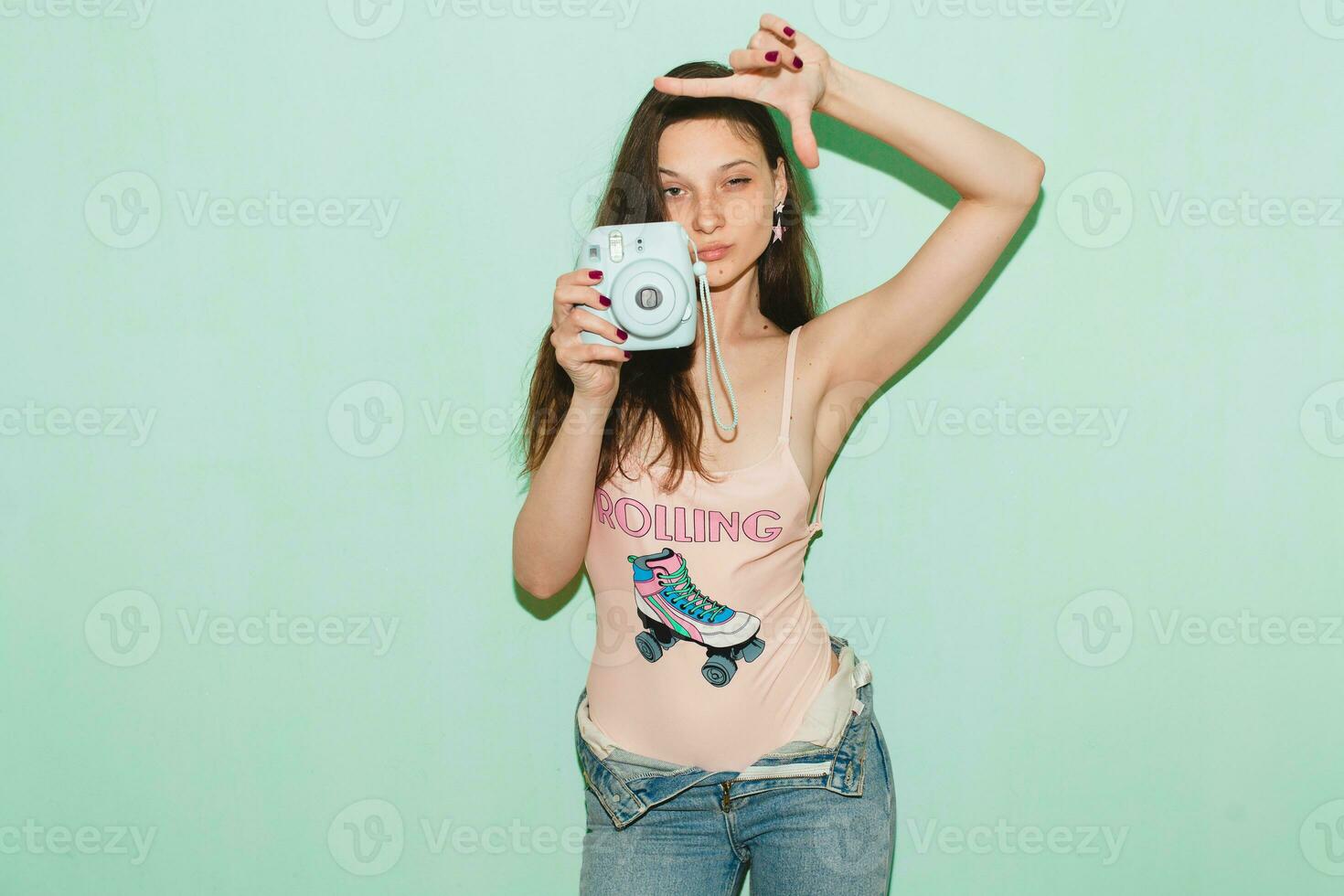 young beautiful hipster woman in hipster style outfit photo