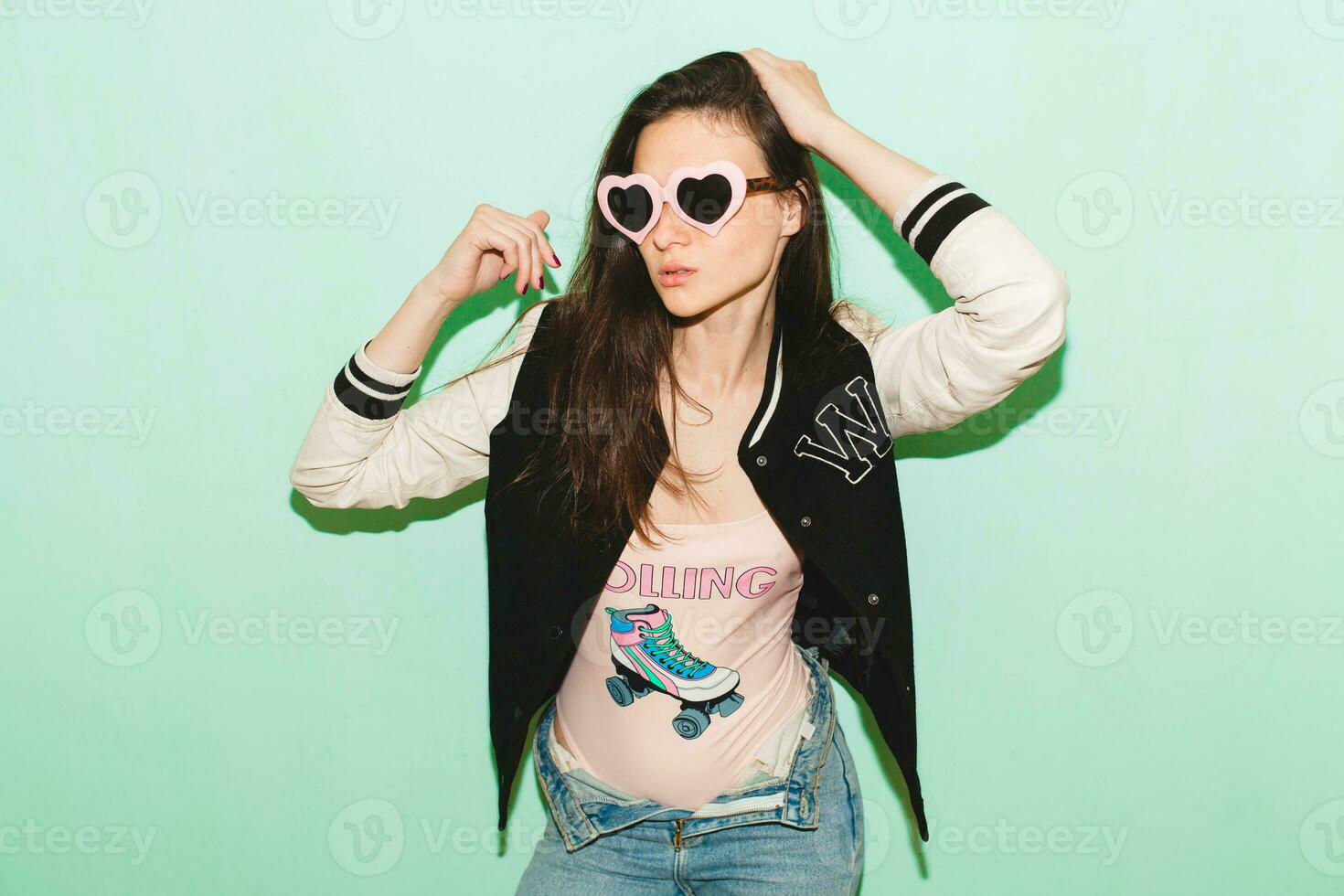 young beautiful hipster woman in hipster style outfit photo