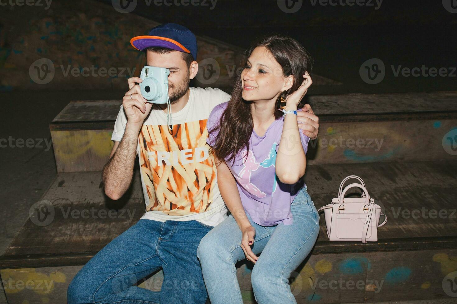 young stylish hipster couple in love, swag outfit photo