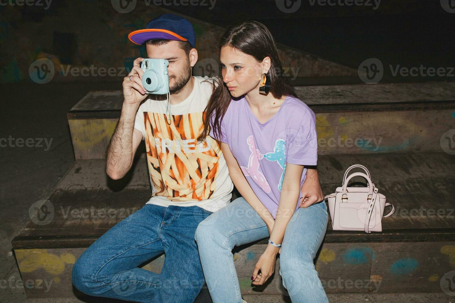 young stylish hipster couple in love, swag outfit photo