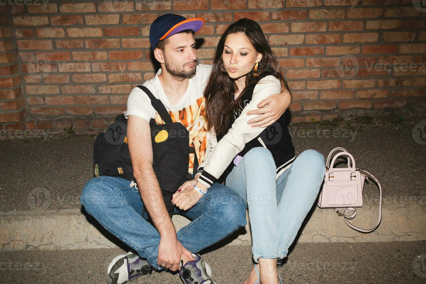 young stylish hipster couple in love, swag outfit photo