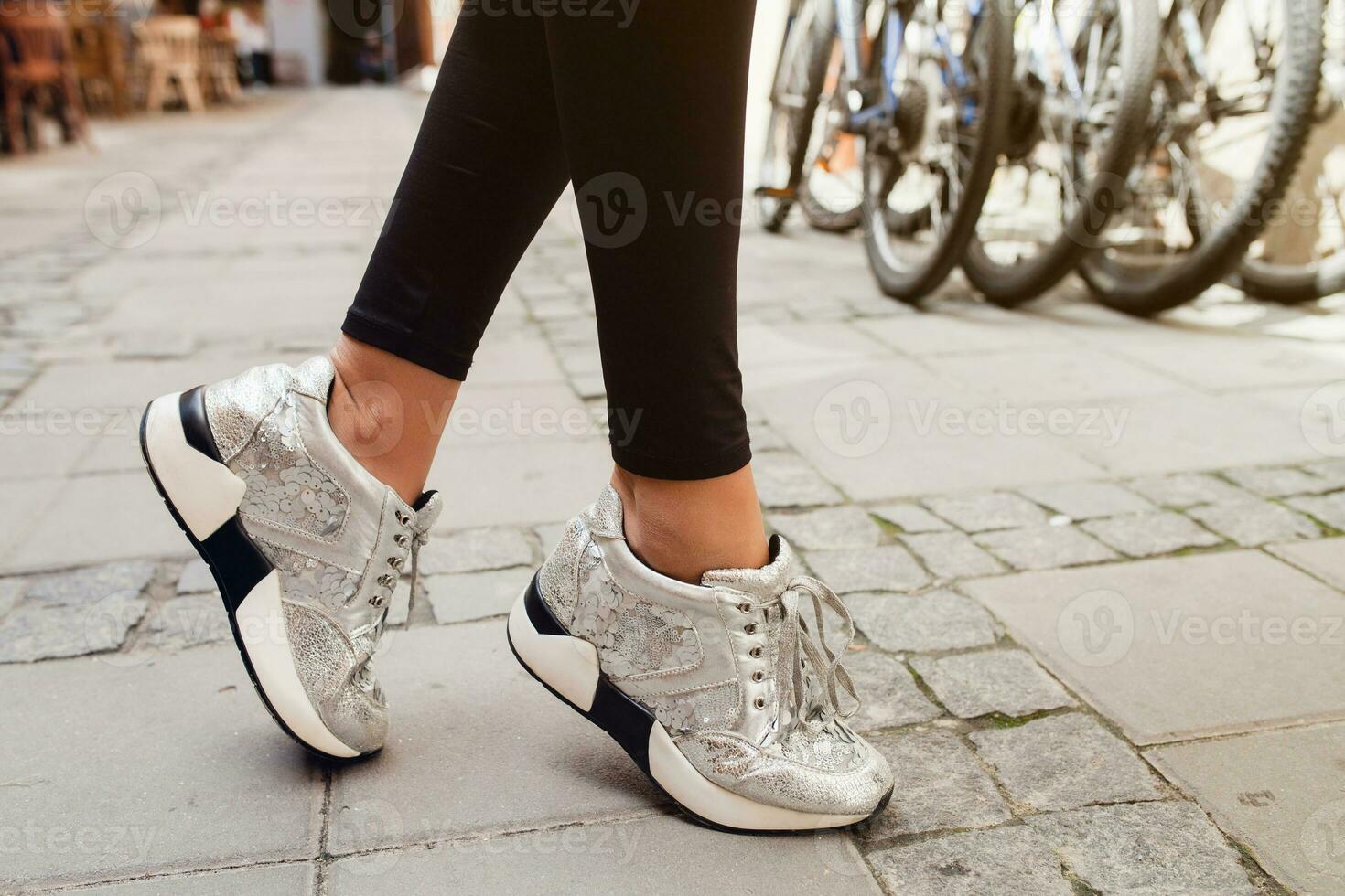 young beautiful stylish hipster woman in shoes details photo