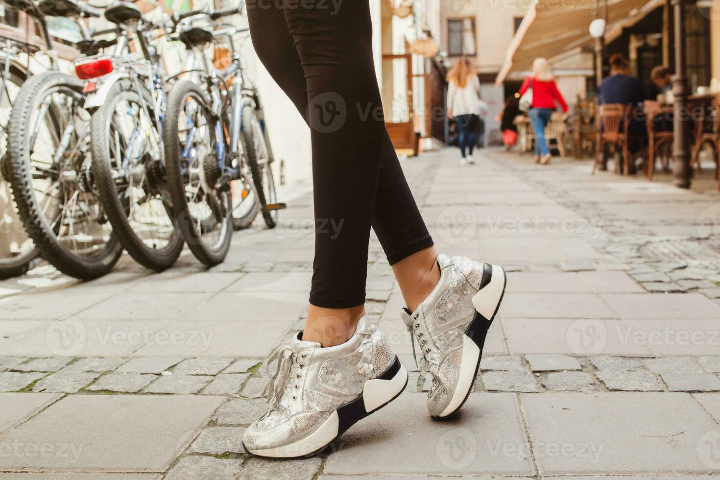 young beautiful stylish hipster woman in shoes details photo
