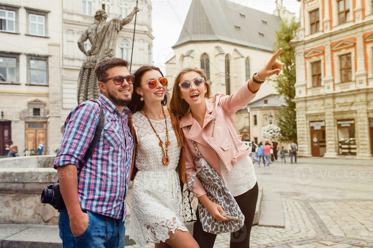 young hipster company of friends traveling, vintage style, europe vacation photo