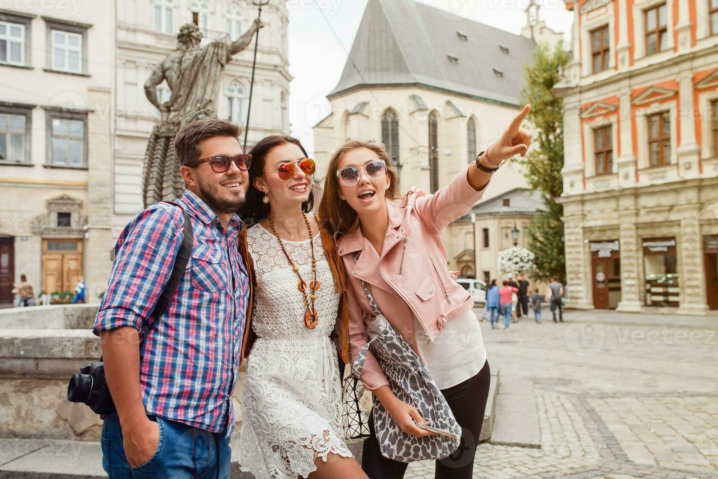 young hipster company of friends traveling, vintage style, europe vacation photo