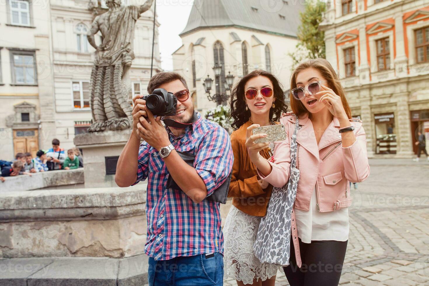 young hipster company of friends traveling, vintage style, europe vacation photo