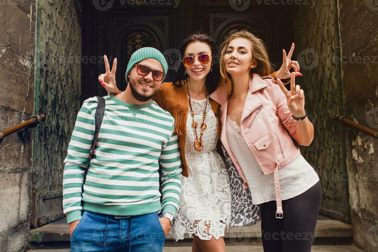 young hipster company of friends traveling, vintage style, europe vacation photo