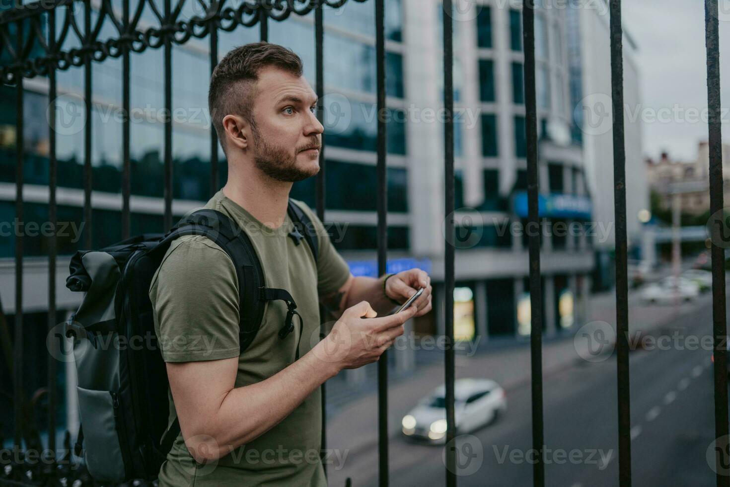 handsome hipster man walking in street photo