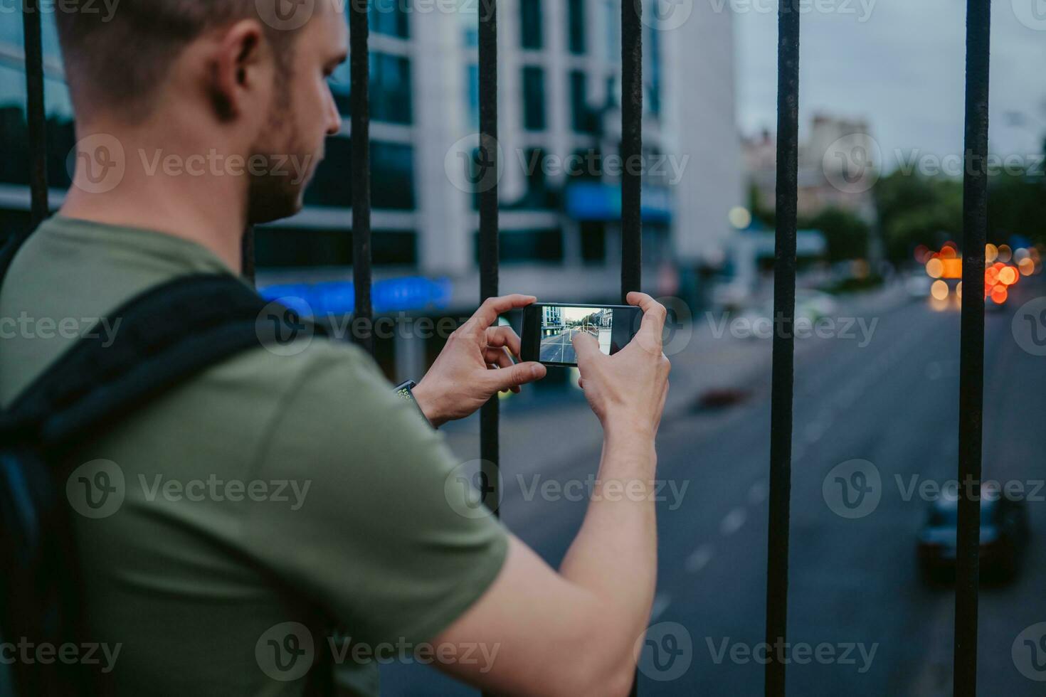 handsome hipster man walking in street photo