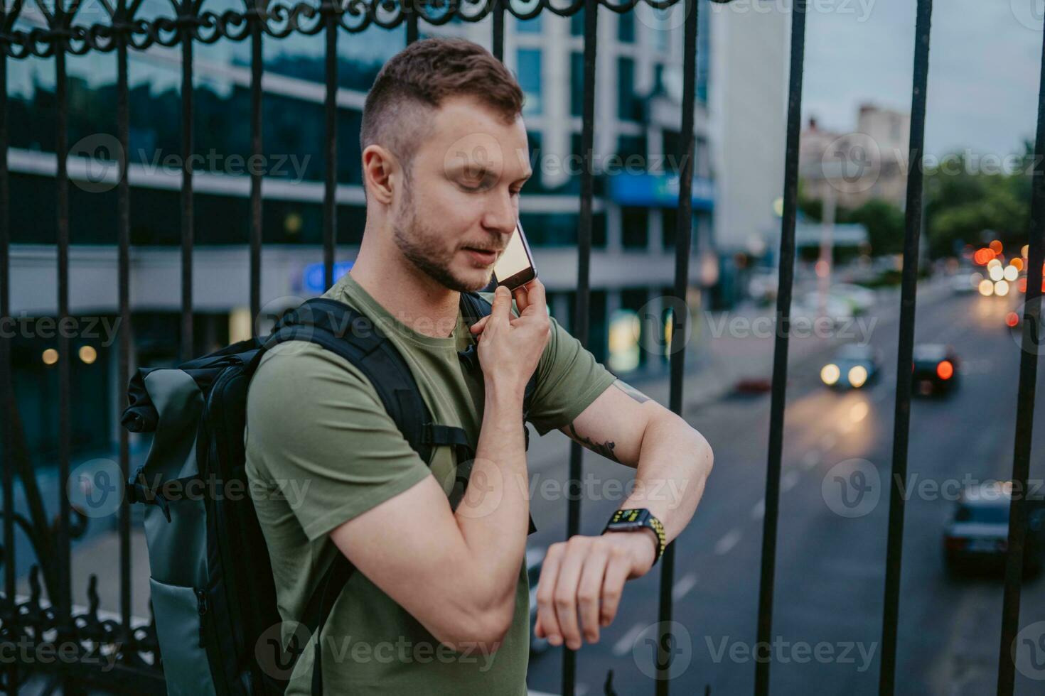 handsome hipster man walking in street photo