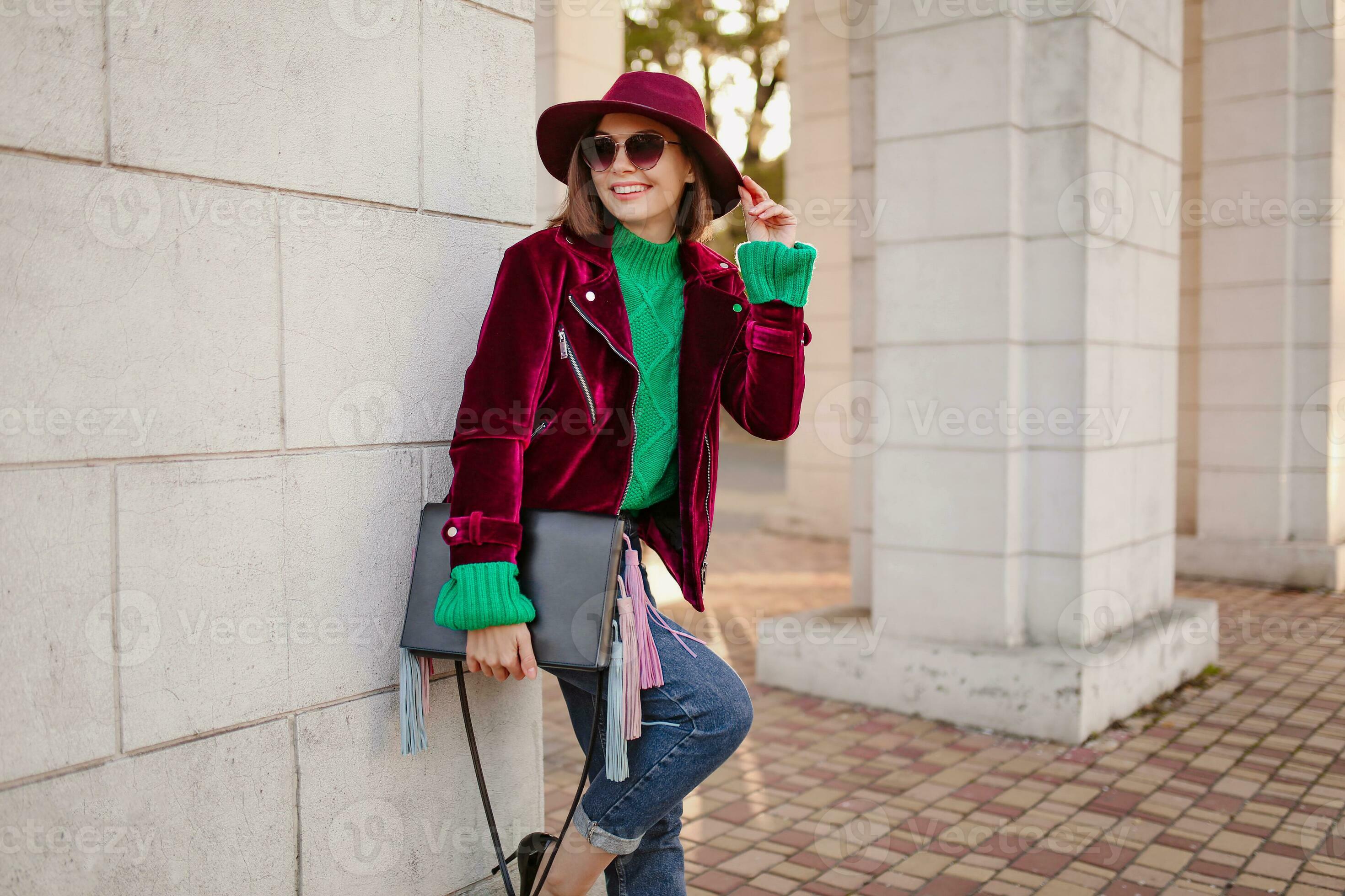 attractive woman in autumn style trendy outfit walking in street