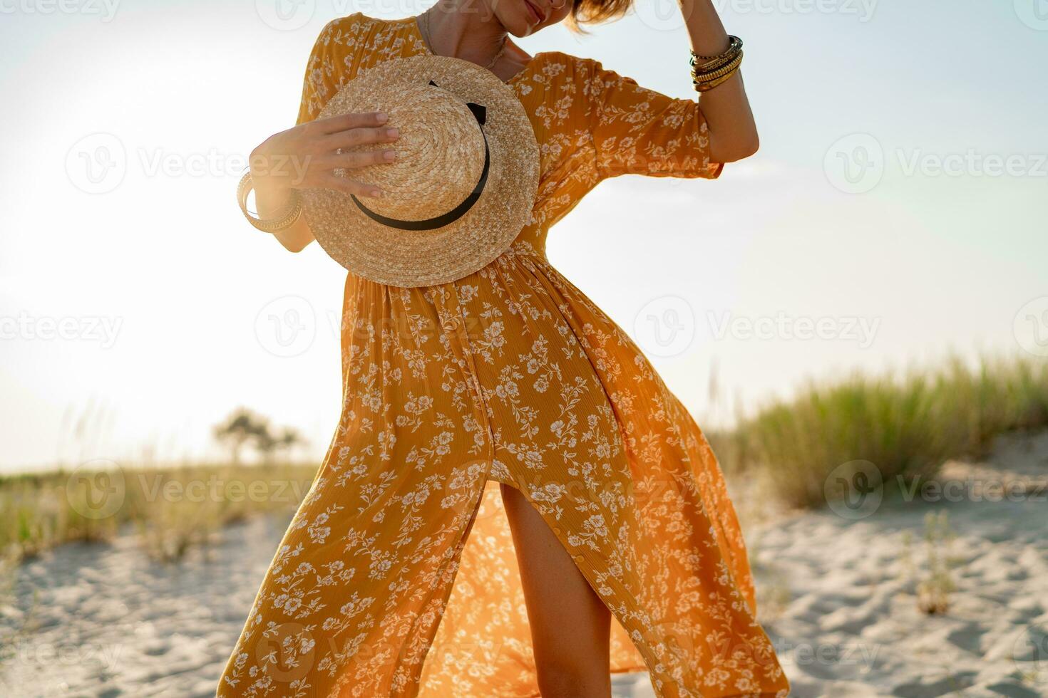 stylish attractive slim woman on beach in summer style fashion trend outfit photo