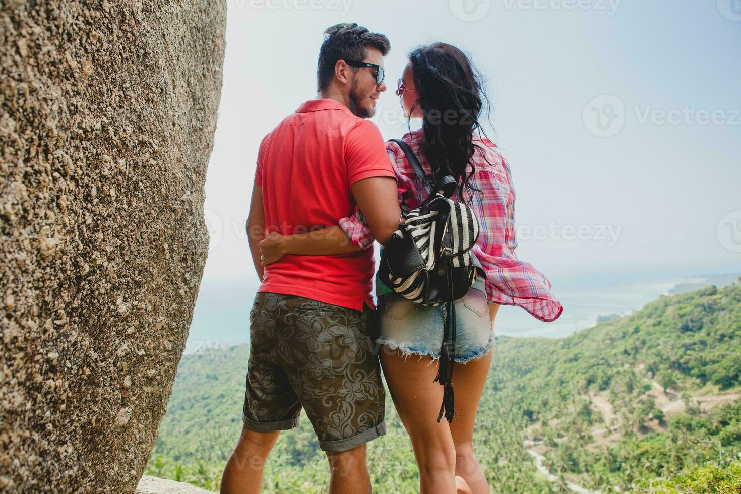 young happy hipster couple in love traveling around world photo