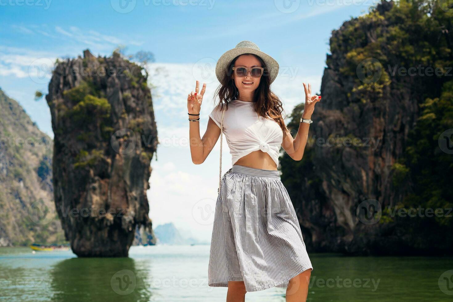 young beautiful woman traveling in thailand photo