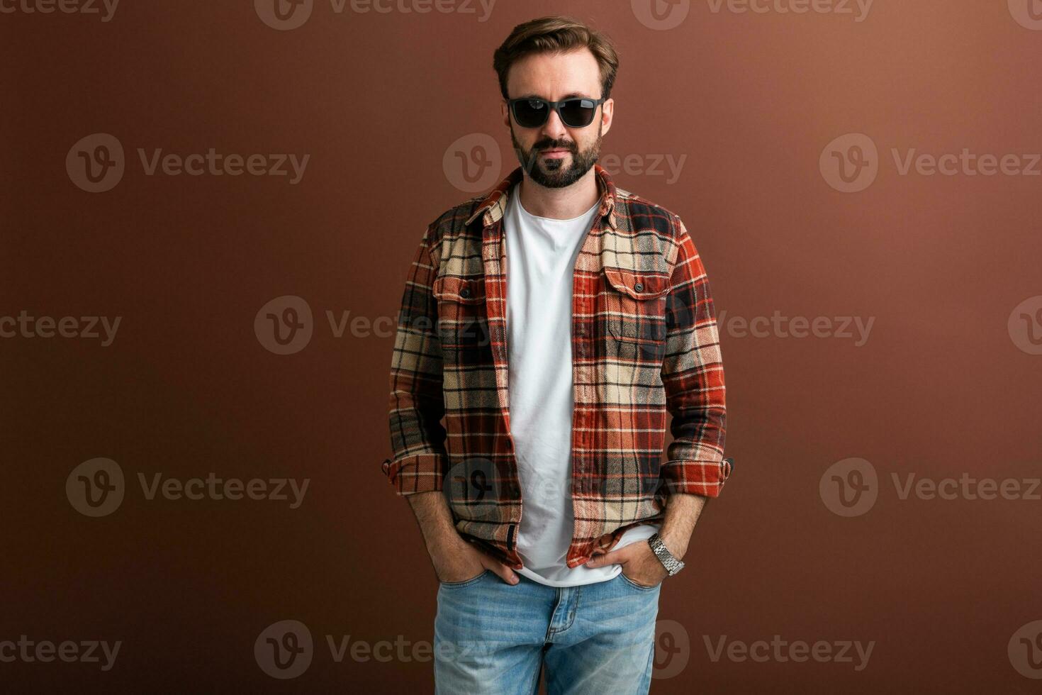 handsome man on brown background photo