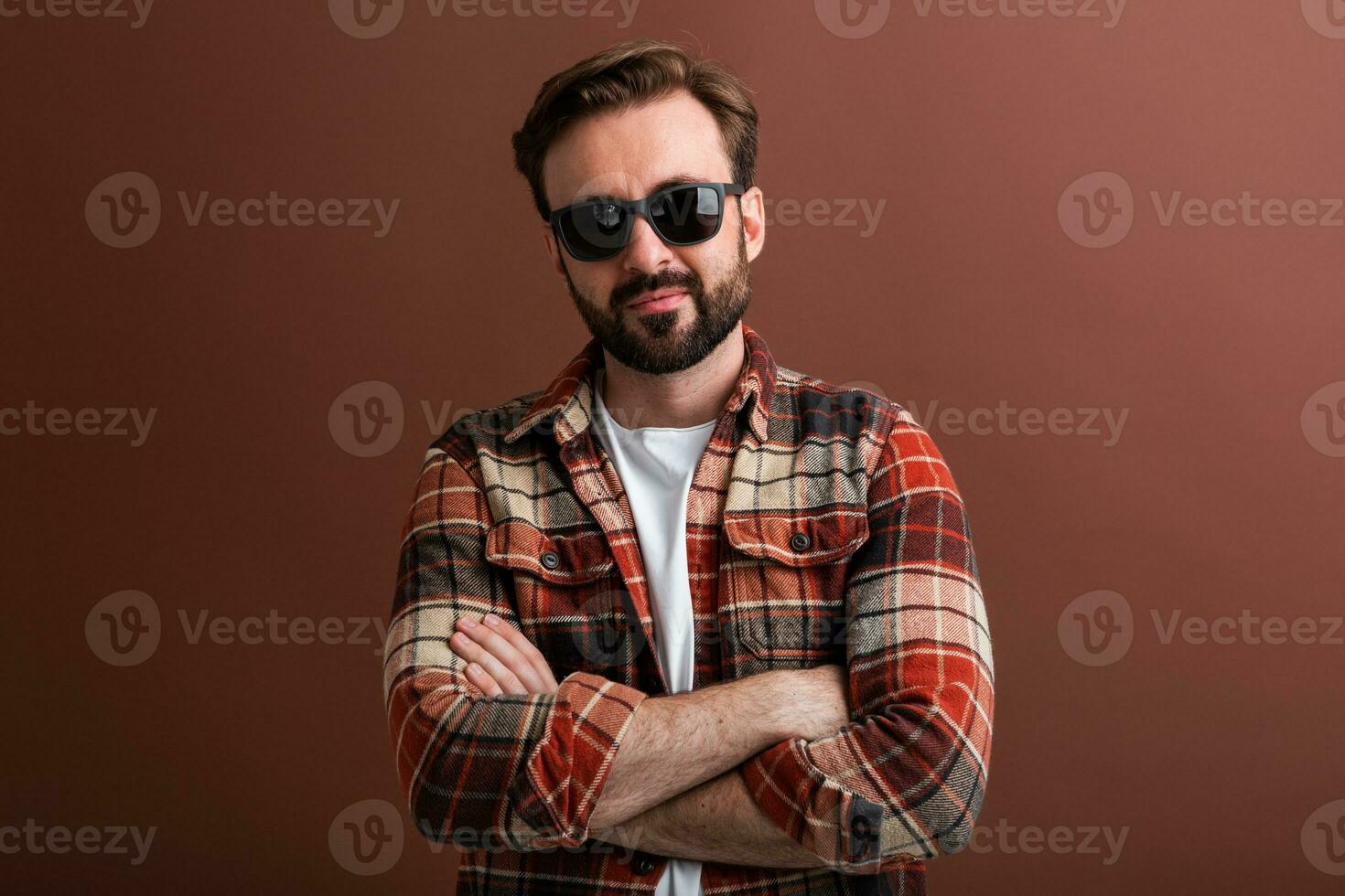 handsome man on brown background photo