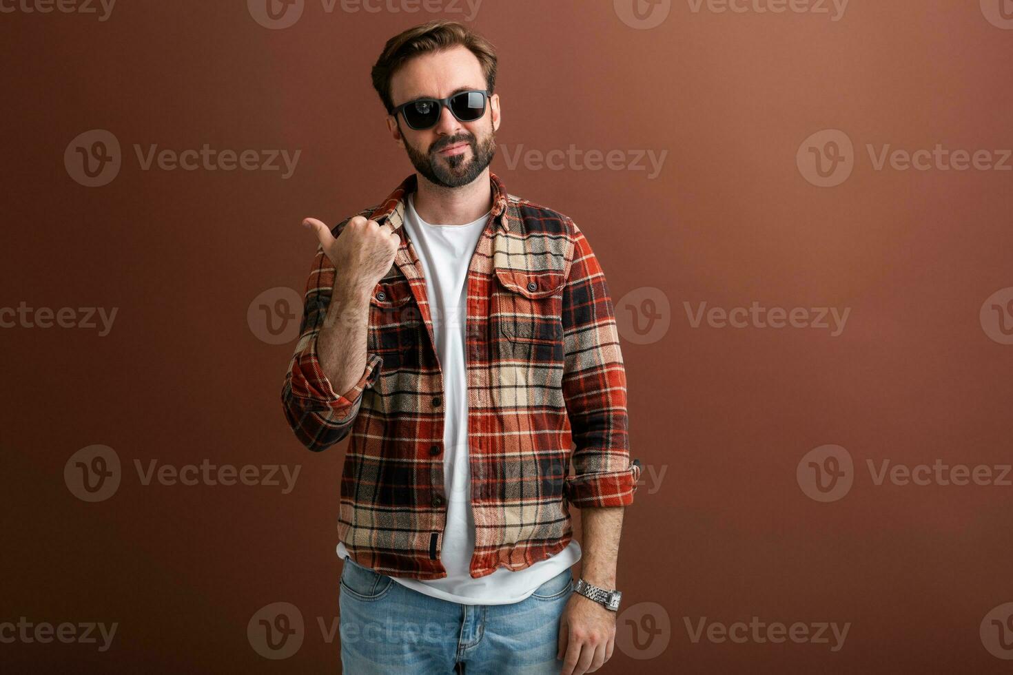 handsome man on brown background photo