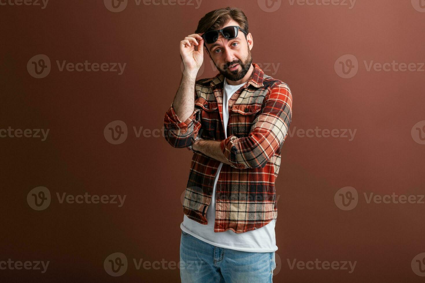 handsome man on brown background photo