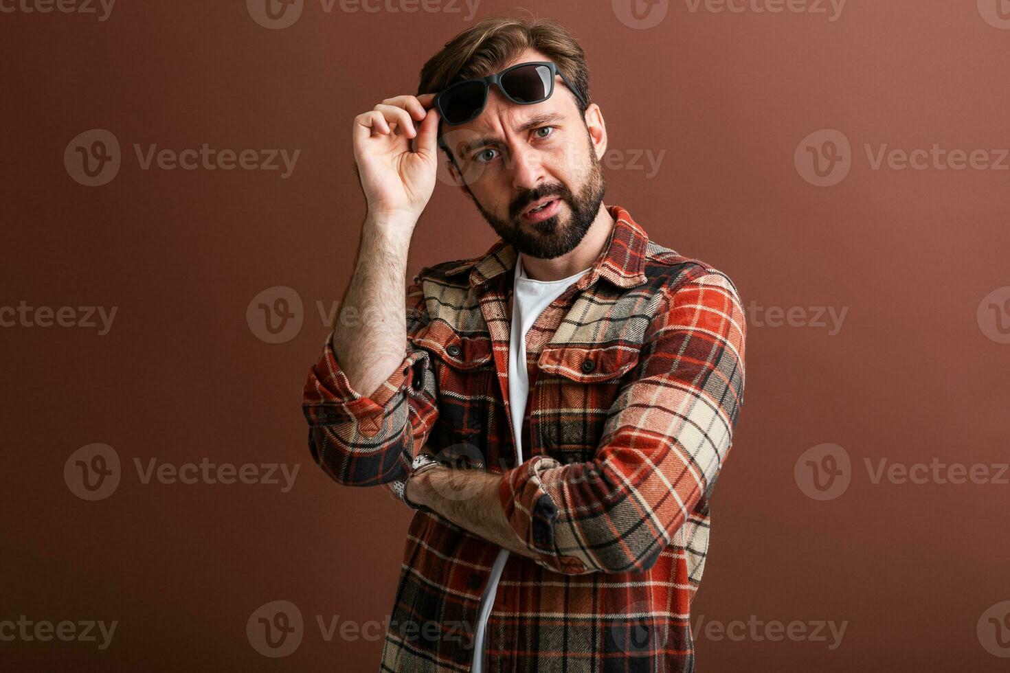 handsome man on brown background photo