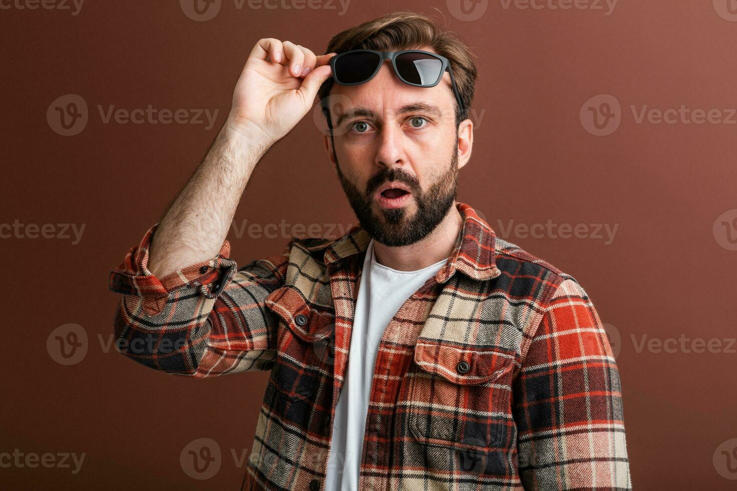 handsome man on brown background photo